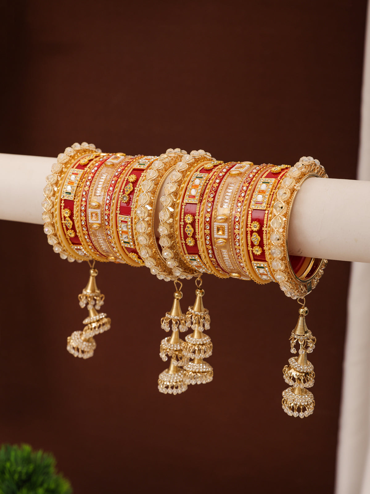Red, Gold & Cream Meenakari Mirror-Work Punjabi Chura - pair on bangle stand